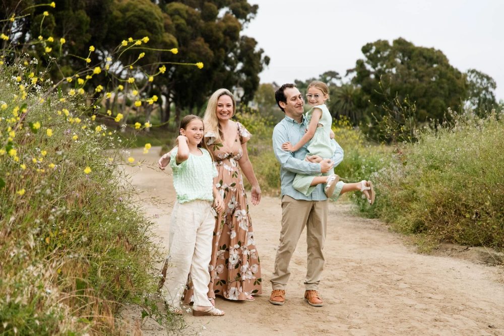 Family hiking on a scenic trail in North County San Diego surrounded by nature