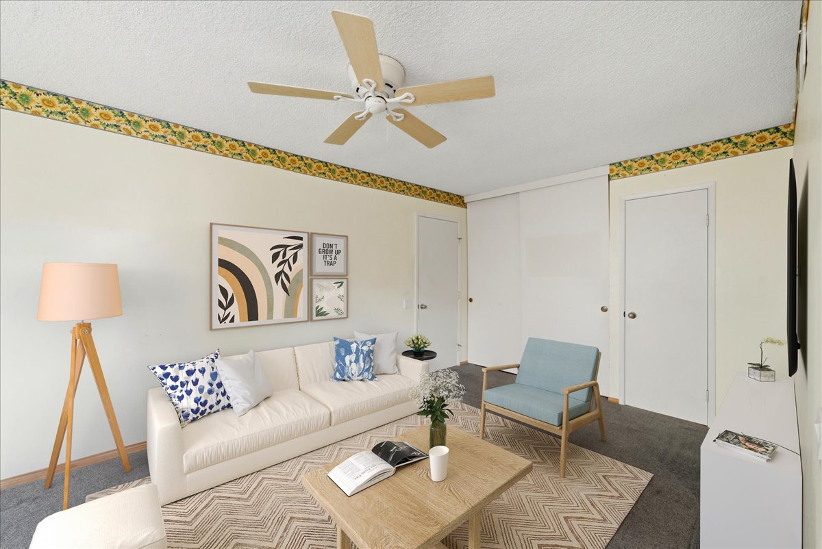 Cozy family room off the kitchen with natural light and open connection to main living areas in Rancho Peñasquitos home