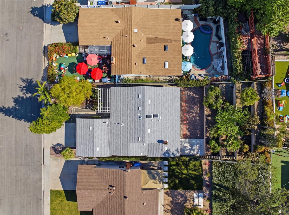 Aerial view of Rancho Peñasquitos neighborhood showing rows of residential rooftops in an established North County San Diego community