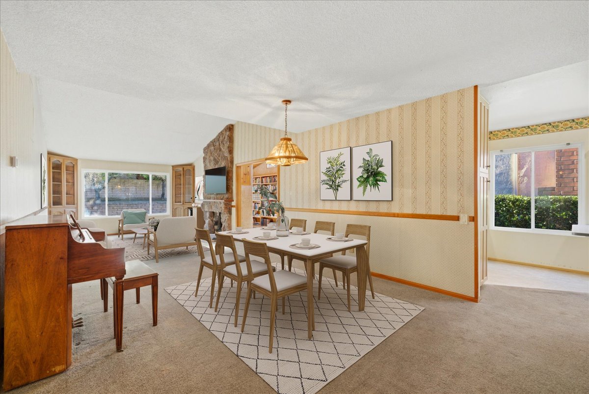 Open dining area connected to living space with natural light in Rancho Peñasquitos home
