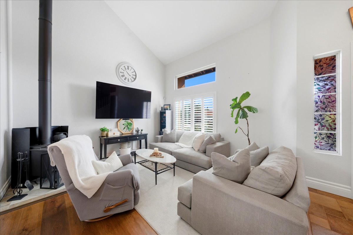 Bright and inviting living room at 24570 New Haven Drive in Murrieta featuring abundant natural light, updated finishes, and an open layout designed for comfortable everyday living and entertaining.